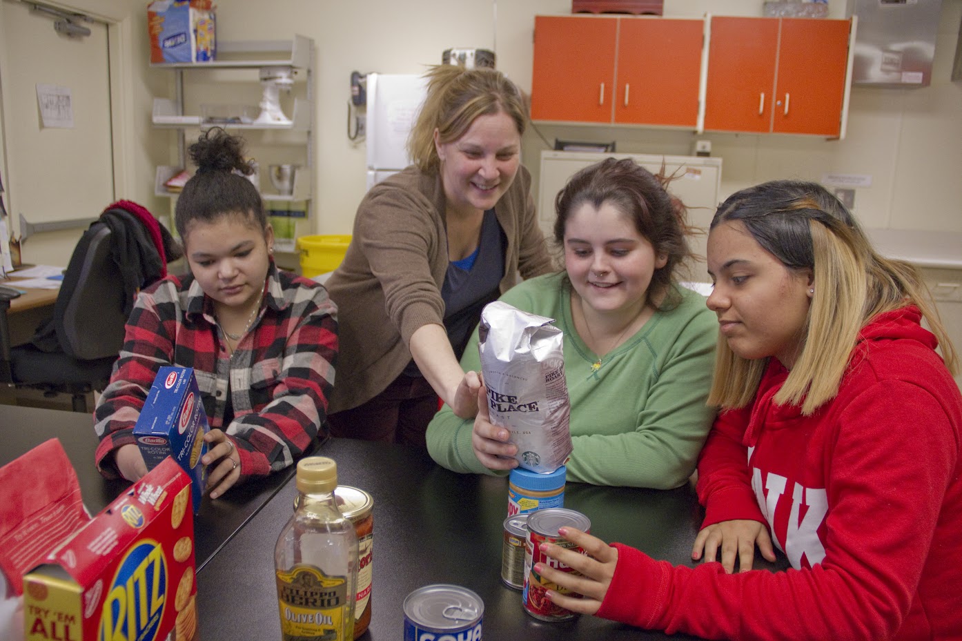 Students looking at kitchen ingredients